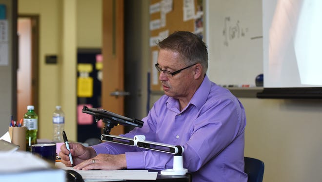 Gary Boer teaches geometry at Sioux Falls Christian High School in Sioux Falls, S.D., Friday, April, 29, 2016. Boer is the last remaining original Sioux Falls Christian teacher.