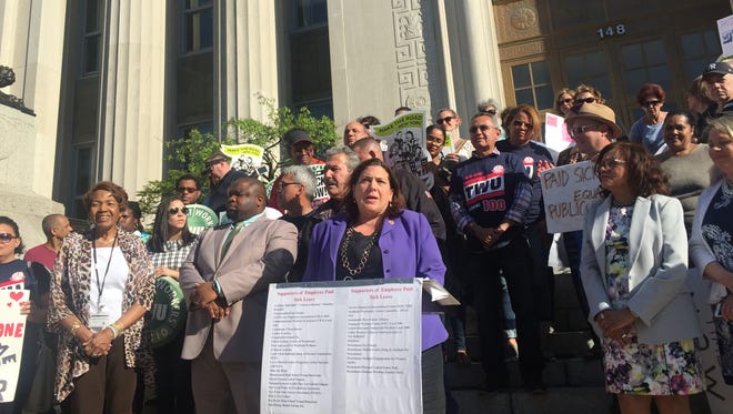 County Legislator Catherine Borgia, D-Ossining, who has sponsored a proposal for paid sick time for many employees who don't have it, addressed a rally Monday in White Plains in which speakers urged passage of the bill.