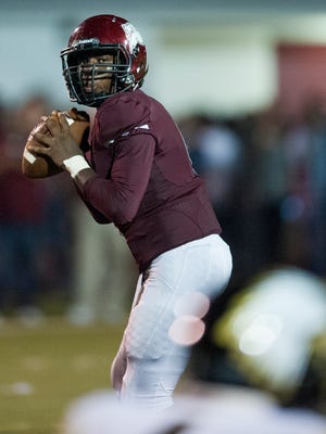 Prattville quarterback Cameron Taylor looks to throw against Wetumpka in Prattville, Ala. on Friday August 19, 2016. 