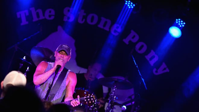 Kenny Chesney performs a concert to celebrate the launch of his "No Shoes Raido" on SiriusXM at The Stone Pony on May 12, 2016 in Asbury Park, New Jersey.