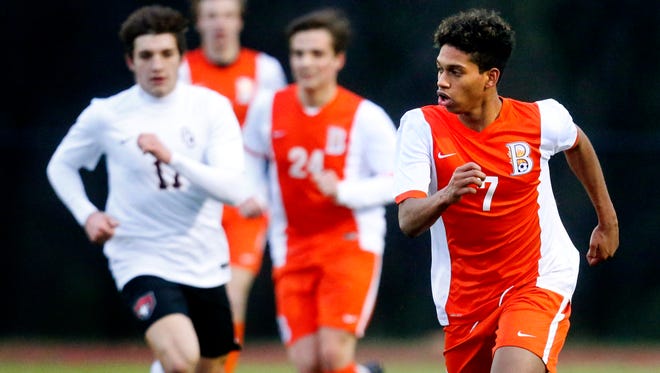 Blackman's Nemo Lazo (7) dribbles upfield during a recent game. Lazo has scored five goals for the Blaze this season.