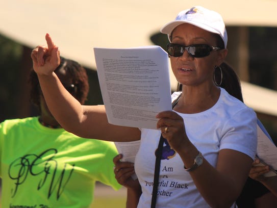 Janelle Wood, 52, led 30 demonstrators in a May 13,