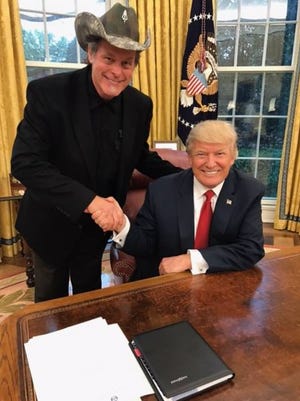 Detroit rocker Ted Nugent, left, with President Donald Trump in the Oval Office on Wednesday, April 19, 2017.