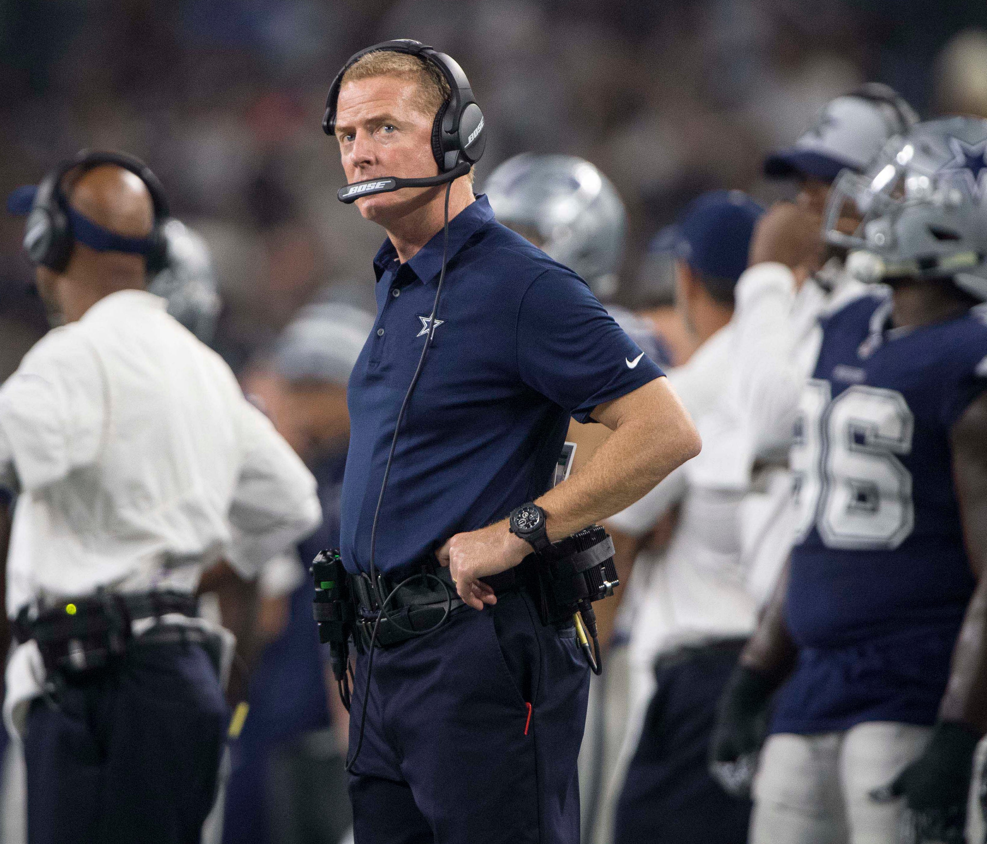 Dallas Cowboys head coach Jason Garrett checks out the replay screen during the second half against the Los Angeles Chargers at AT&T Stadium.