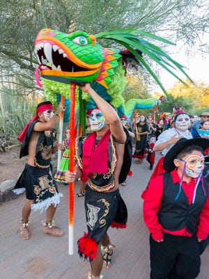 During Dia de Los Muertos celebrations, participants pay homage to loved ones who have died.