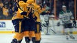 Oct. 12: Predators players celebrate after a goal by