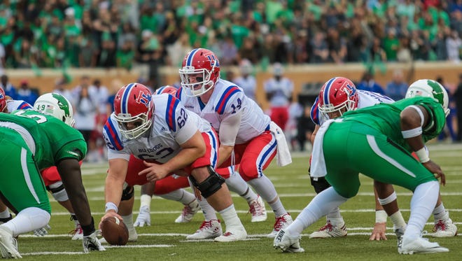 Louisiana Tech quarterback Ryan Higgins (14) is leading one of the nation's top offenses this year.