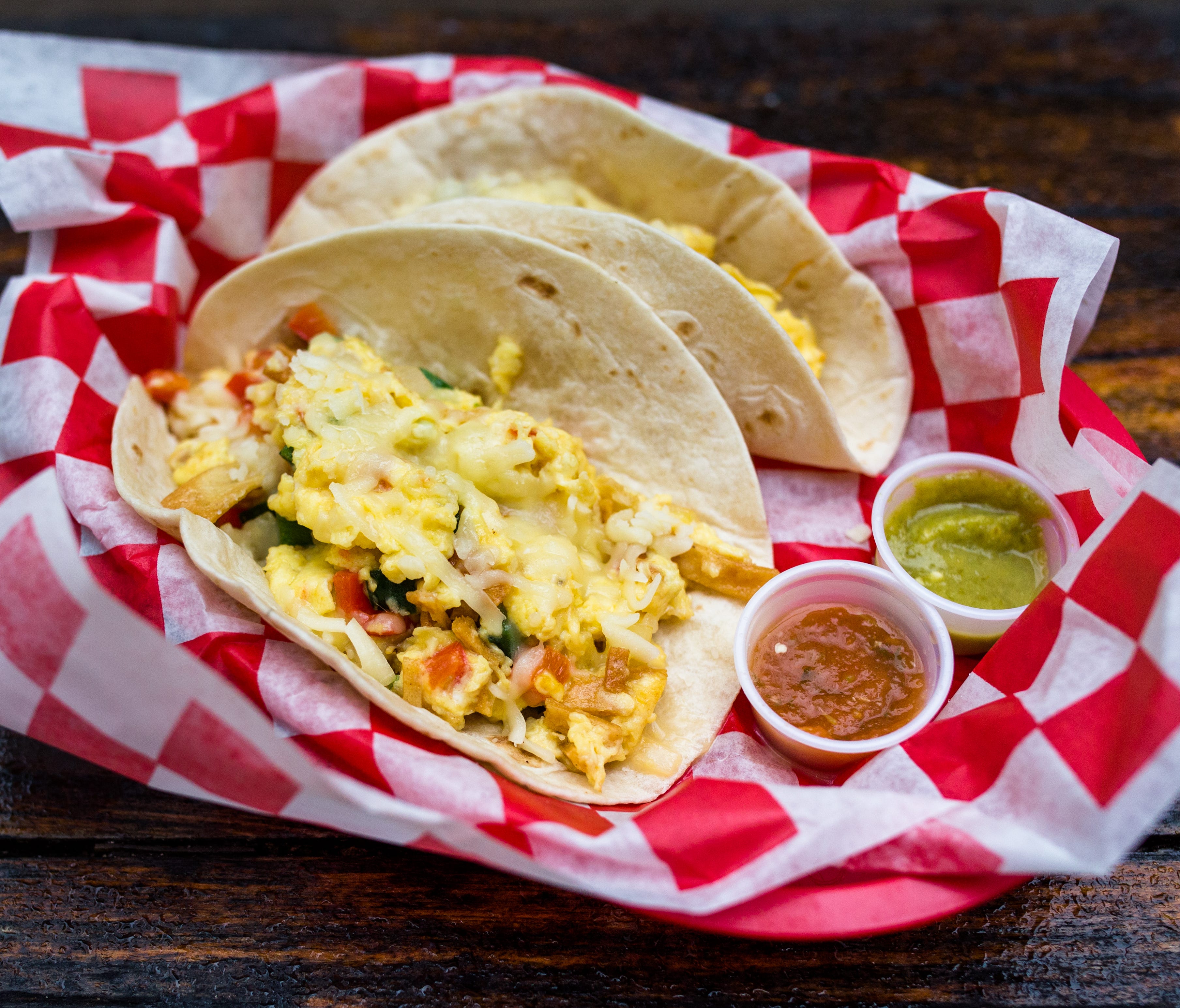 In addition to coffee, Jo's serves hot breakfast tacos, starting at 8 a.m. and lasting until they sell out, which can be as early as an hour into breakfast service.