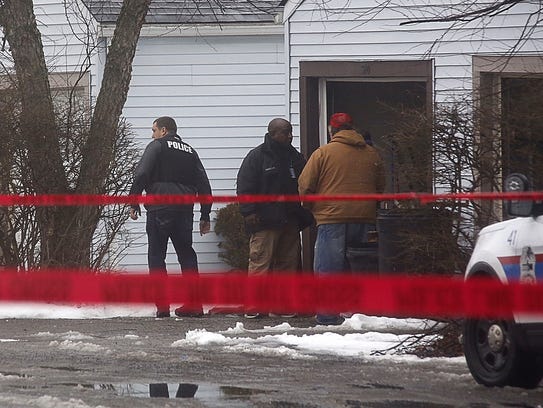 Police investigate the scene of a shooting in Westerville,
