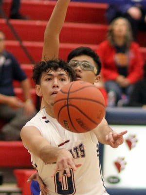 Wildcat sophomore Little Saldivar (0) was the spark the Wildcats needed in surging past the Chaparral High Lobos during a second-half scoring run. Saldivar would total 13 points in a 69-60 Wildcat victory over the visiting Lobos.