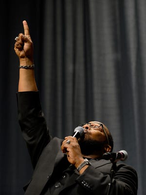 Gospel recording artist and pastor of Lighthouse Full Life Center Church in Grand Rapids Marvin Sapp sings "Never Would Have Made It," during the 30th Annual MLK luncheon at the Lansing Center, Monday, January 19, 2015.