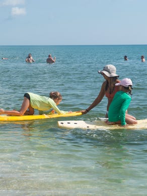 Calm seas didn't stop Ohana Surf campers from enjoying the ocean Friday, June 22, 2018 during the Ohana Surf Camp at Stuart Beach on South Hutchinson Island. About 20 children attended this week's camp and at 12 years strong, this is the longest running surf camp in Martin County, said Ohana Surf Shop owner Jordan Schwartz. For information on July and August's surf camps through Ohana Surf Shop, go to www.ohanasurfshop.com. 