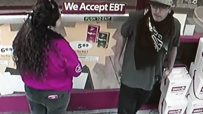 Security footage of an alleged armed robber in an Indio Circle K on May 26.