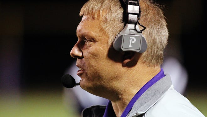 Rayne coach Curt Ware got his Wolves through a tough District 4-4A opener at Washington-Marion on Friday.