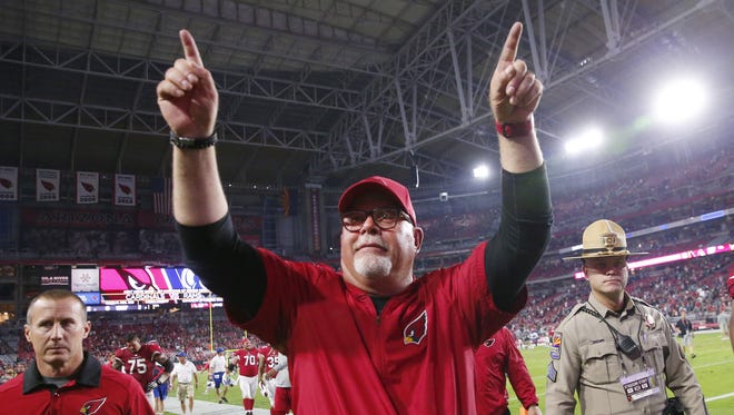 Arizona Cardinals head coach Bruce Arians points towards the stands after beating the Jacksonville Jaguars 27-24 at University of Phoenix Stadium in Glendale, Ariz. November 26, 2017.