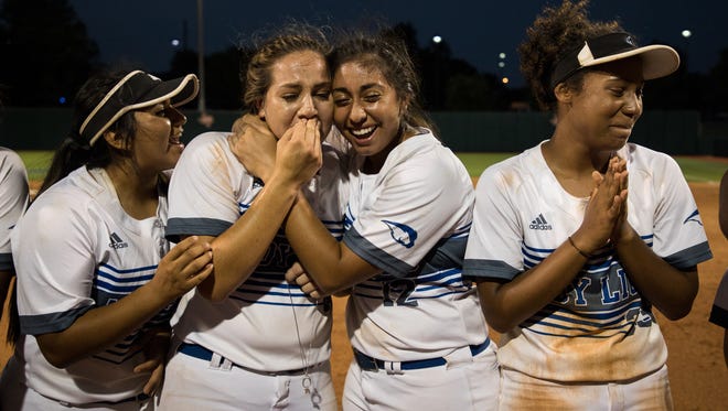 Santa Gertrudis's Saidi Castillo and Kennedy Silva  celebrates winning the 3A state championship game against Hughes Springs at McCombs Field in Austin on Thursday, May 31, 2018.  