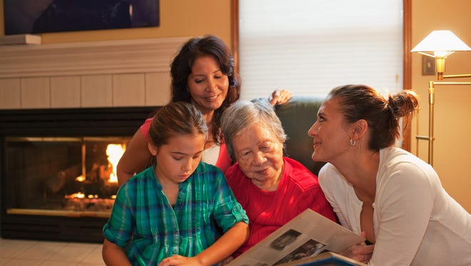Reminiscing about the past is a way of keeping aging parents connected to their legacy. And, from a cognitive perspective, looking at old family photographs triggers long-term memories, which is an added benefit for helping with cognitive decline.