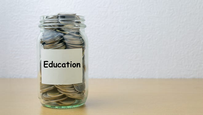 Money saving for Education in the glass bottle