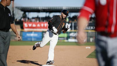 San Francisco Giants first baseman Chris Marrero (49) rounds third on his way home after hitting a 3-run walk off home run in the bottom of the ninth inning of the MLB Spring Training game between the San Francisco Giants and the Cincinnati Reds at Scottsdale Stadium in Scottsdale, Ariz., on Friday, Feb. 24, 2017. The Reds fell to the Giants, 6-4.