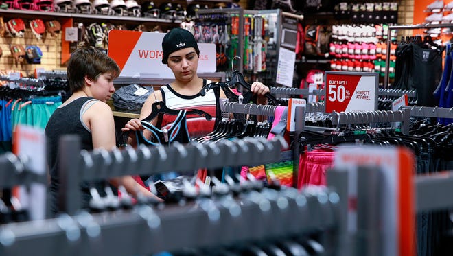 Savanah Casaus, left, and McKinzie Seals shop at Hibbett Sports on May 20, at the Animas Valley Mall.