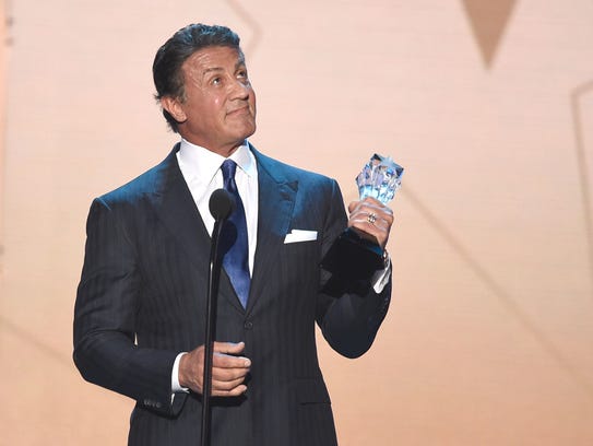 Sylvester Stallone accepts the Best Supporting Actor
