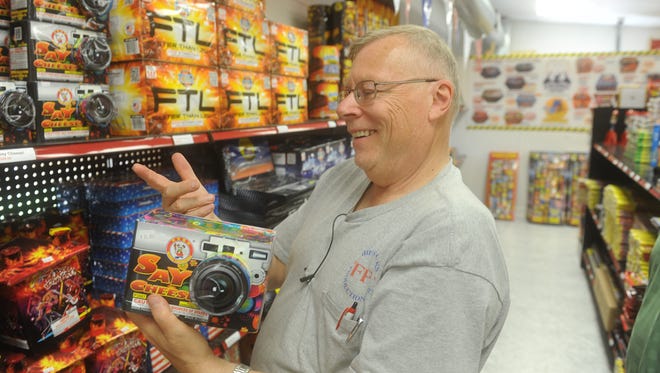 Dennis Coster, manager at Fireworks Fantasy in Glen Rock, jokes about the different names of fireworks in his store on Friday, June 19, 2015.