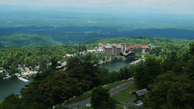 The Mohonk Mountain House in New Paltz sits snugly beside a glacial lake.