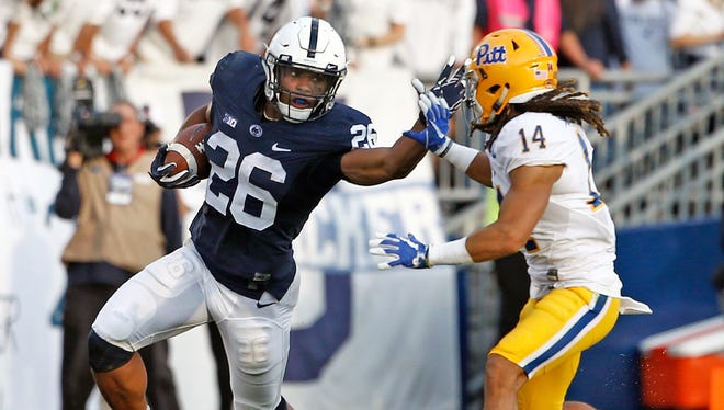 Penn State running back Saquon Barkley is averaging 6.4 yards a rush and 13.6 yards a reception this season.