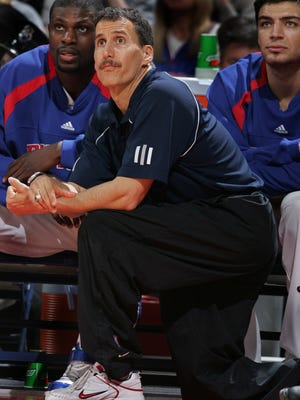 Detroit Pistons strength and conditioning coach Arnie Kander watches action in 2007.
