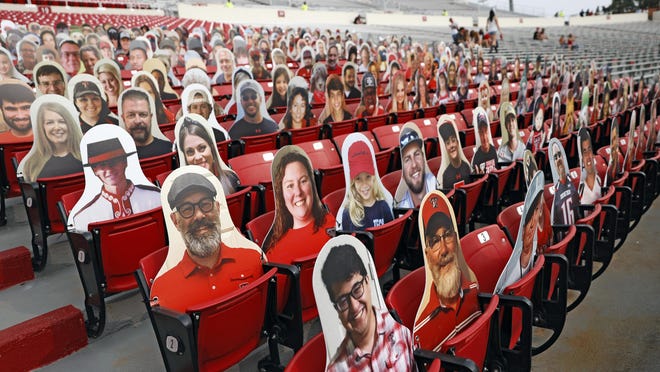 Cutout pictures of fans adorn the east side of Jones AT&T Stadium for Texas Tech's season opener Sept. 12 against Houston Baptist. In a normal year, Texas Tech could sell 60,000 tickets for this week's game against Texas, but the Red Raiders will have a negligible home-field advantage because of crowd limitations for COVID-19.
