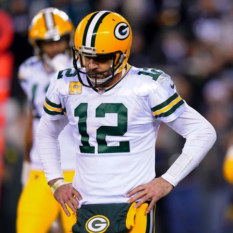 Green Bay Packers quarterback Aaron Rodgers reacts