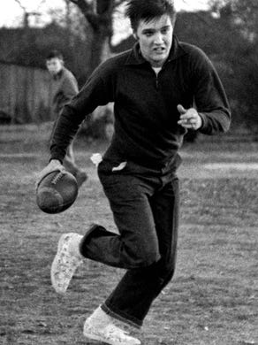 Elvis Presley playing touch football at the Dave Wells