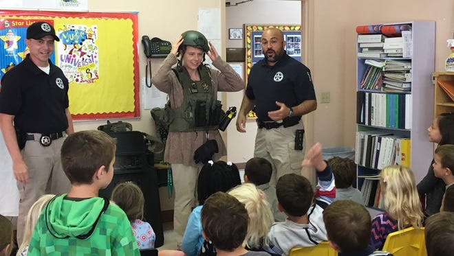 U.S. Marshals from the Las Cruces office visit Mission Lutheran School on Oct. 5, 2016.