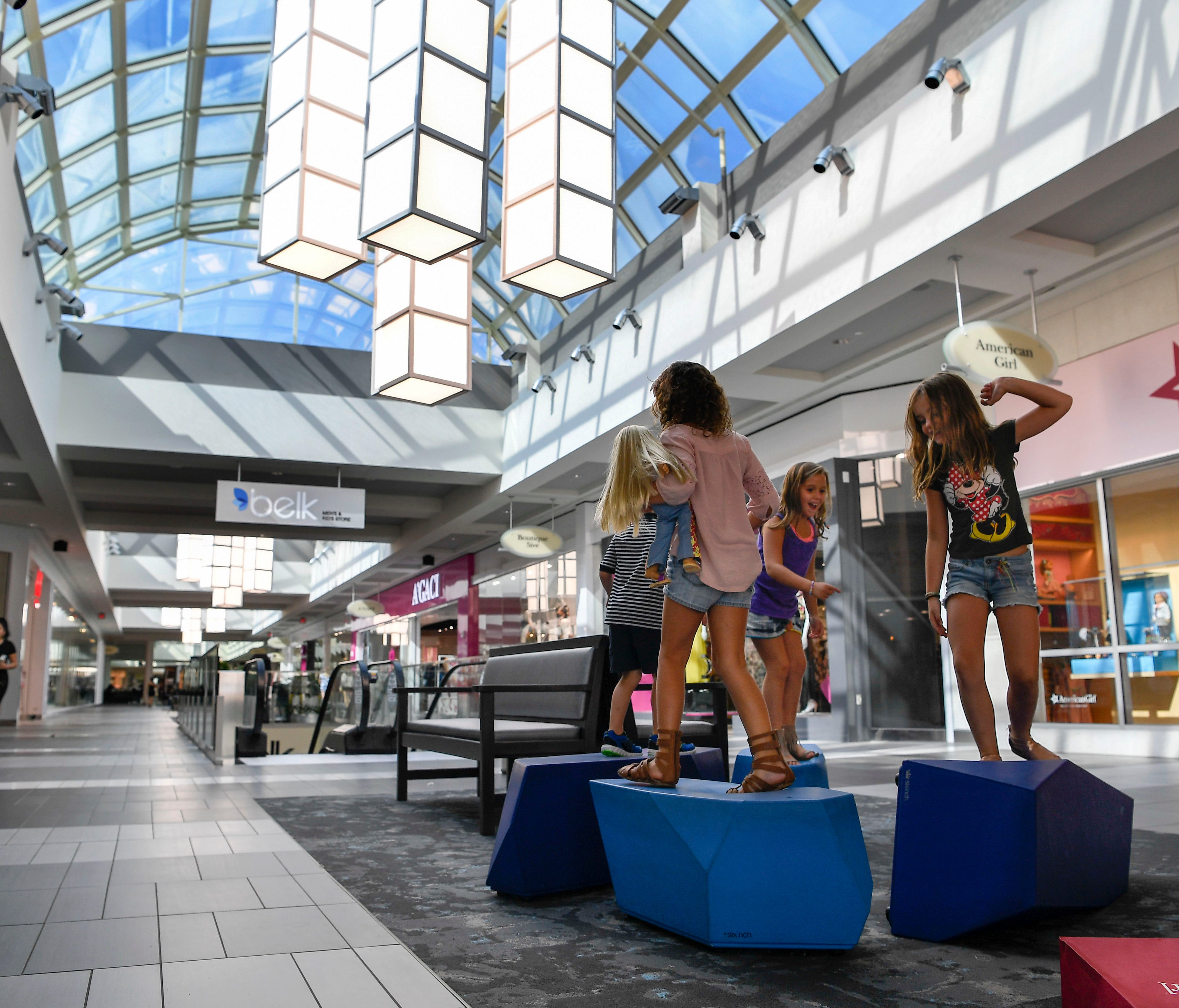 Children play after shopping at the American Girl Shop at the Cool Springs Galleria in Franklin, Tenn.