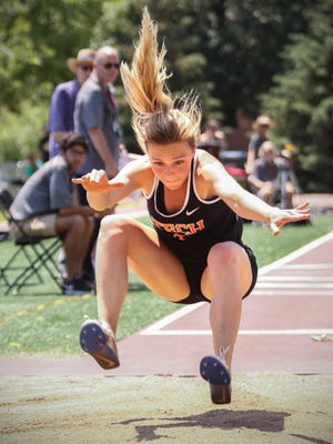 Tech’s Jodi Lipp competes in the triple jump Saturday, June 10, during state track and field competition at Hamline University in St. Paul. Lipp finished second place in the event.