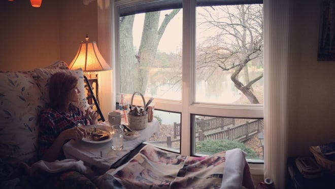 Joey Martin Feek looks out the window of the family's new temporary home.