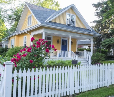 House with white picket fence