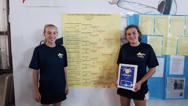 Emma Messenger and Grace Messenger pose after winning the Section 9 girls tennis doubles title on Wednesday.