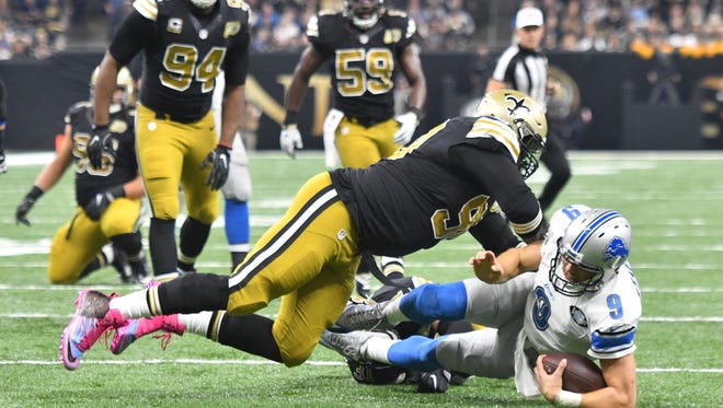 Former Lions defensive tackle Nick Fairley, now with the Saints, sacks Matthew Stafford in the first quarter.