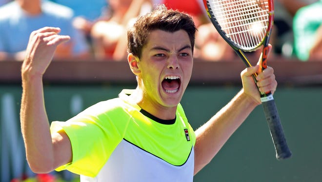 San Diego-area high schooler Taylor Fritz celebrates after defeating Dudi Sela of Israel in straight sets 6-3, 6-0, on Tuesday afternoon, March 10, 2015 in Stadium 2 of the Indian Wells Tennis Garden during the second day of the BNP Paribas Open.