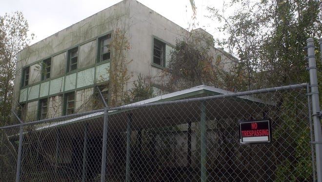 The Sunland Hospital, a hulking, five-story building on Phillips Road had been abandoned for 20 years. This is how it it looked as of Dec. 7, 2004.