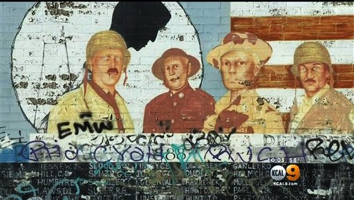 This image from video provided by KCBS-TV/KCAL-TV shows graffiti on a Vietnam War memorial in the Venice area of Los Angeles.