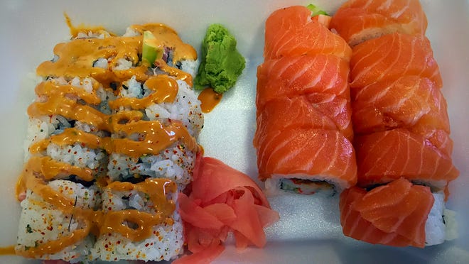 The Spicy Tuna roll ($4.70), left, includes tuna and cucumber topped with spicy mayo. The Alaskan roll ($9.50) features spicy crab, cucumber, crunchies and scallions. It is topped with salmon.