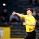 Former ASU standout Willie Bloomquist throws out the ceremonial first pitch before Arizona State plays TCU at Phoenix Municipal Stadium on February 20, 2015.