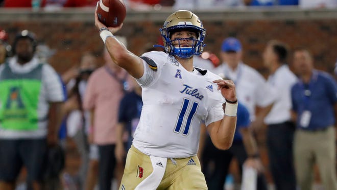 Tulsa quarterback Zach Smith throws a pass during the first half of an NCAA college football game against SMU, Saturday, Oct. 5, 2019, in Dallas, Texas. (AP Photo/Roger Steinman)