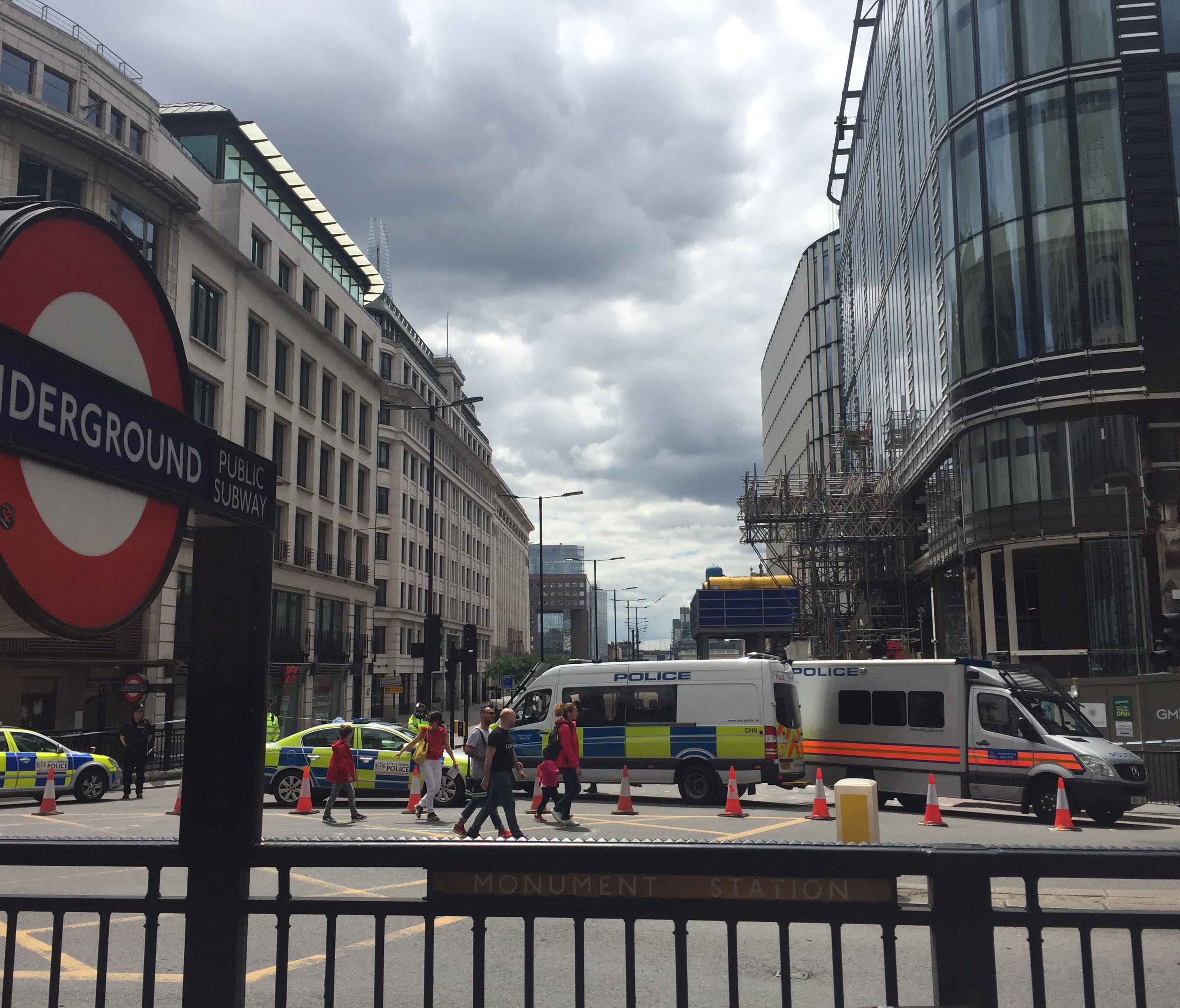 Police vehicles blocking access to London Bridge.