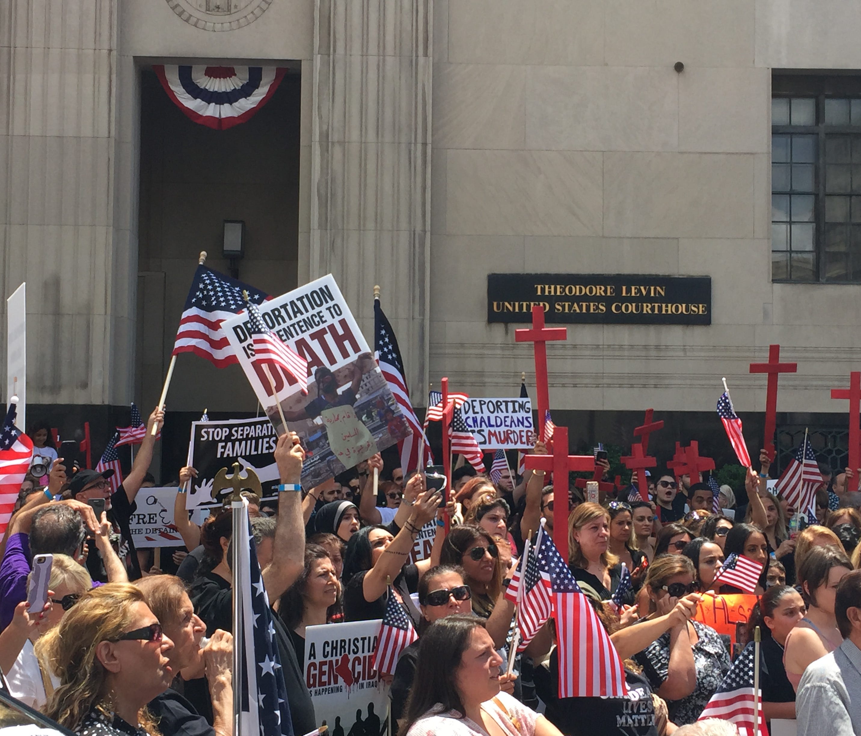 Hundreds of Iraqi-American Christians rally on June 21, 2017, outside the U.S. District Courthouse in Detroit during a court hearing for the 114 Iraqi immigrants arrested by ICE in June in metro Detroit.