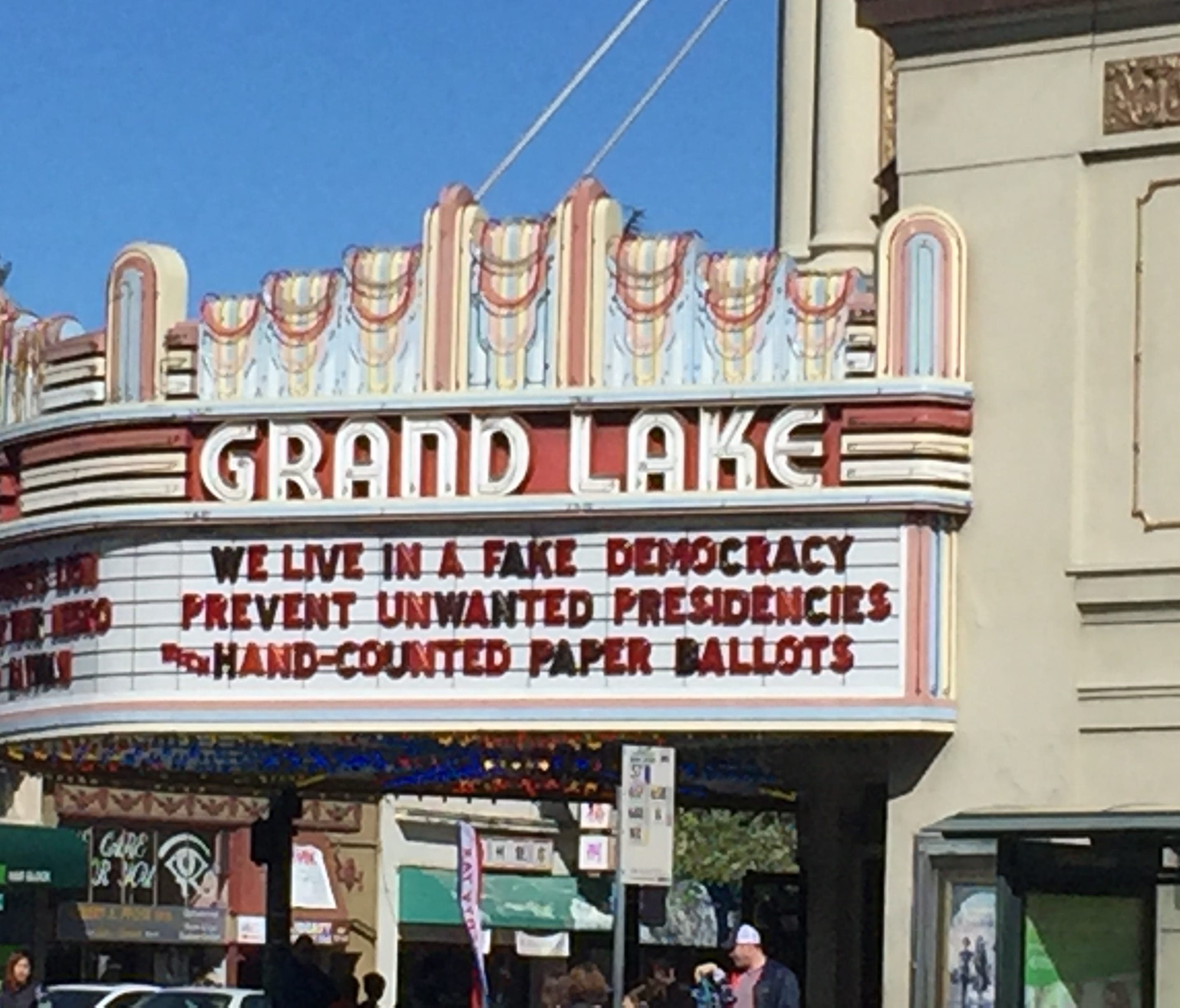 A marquee at the Grand Lake Theater in Oakland, Calif. The theater frequently posts pointed political and social commentary. This one concerned the possibility that the U.S. election might have been hacked, which election experts say can be prevented