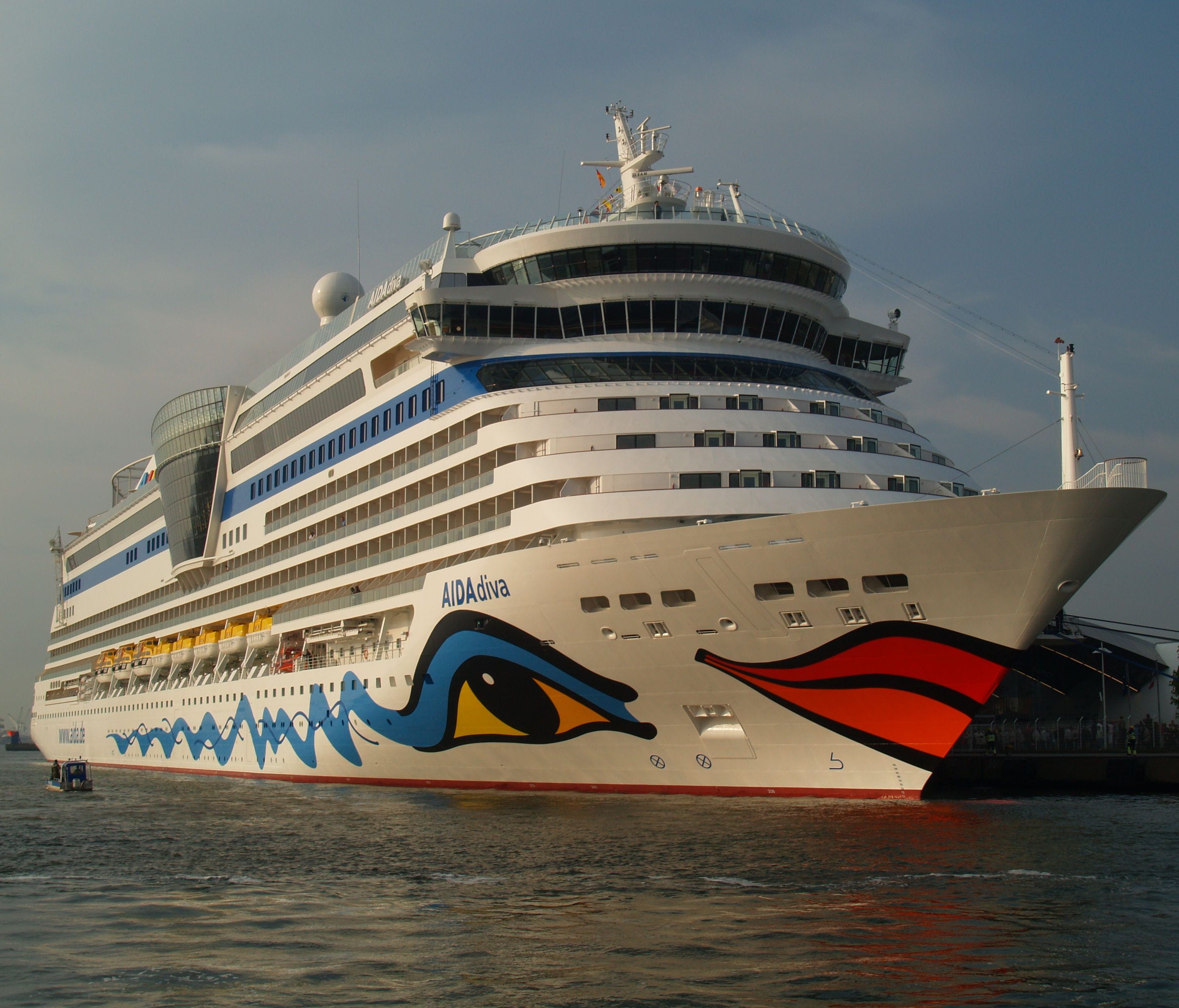 Yes, those are giant red-and-orange lips on the front of a cruise ship. German line Aida Cruises has made the multi-deck-high lips on its ship hulls a signature. Aida is credited with starting the hull art trend way back in the 1990s.