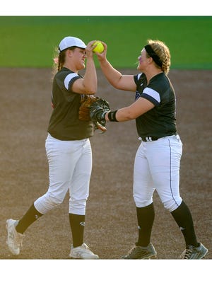Wylie pitcher Kamwren Jackson (10) is congratulated by teammate Bailey Buck (17) after a strikeout in the top of the sixth inning of the Lady Bulldogs' 1-0 win over Brownwood in the District 5-4A tiebreaker on Friday, April 21, 2017, at Poly Wells Field. 
